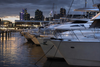 Melbourne Docklands marina lined with cruisers during a boat show